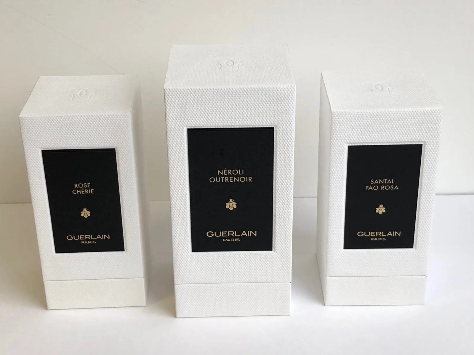 Guerlain · Étuis blancs — réalisation Maq’Exe